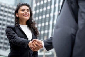 business woman shaking hands