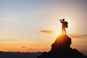explorer on a mountain top