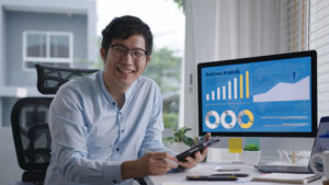 young man at computer desk