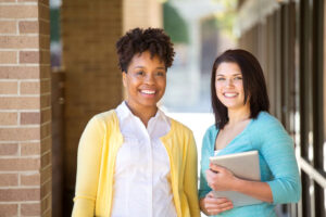 administrators outside building