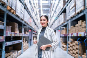 businesswoman in warehouse