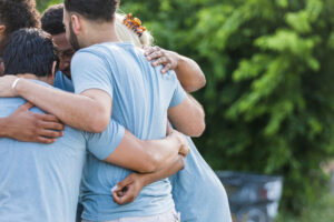 group of volunteers hugging