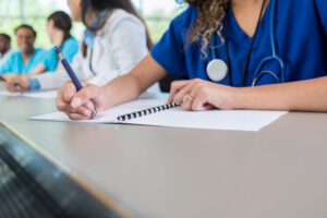 nurse taking notes