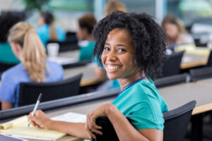 smiling medical student in classroom