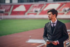 businessman at track stadium 