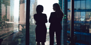 businesswomen in an office window