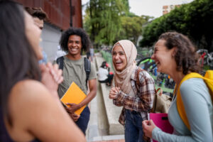 diverse students laughing together