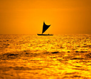 outrigger canoe in hawaiian waters