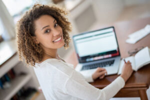 young woman studying at home