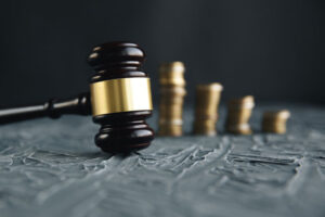 gavel and stack of coins