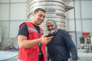 health and safety engineers laughing together