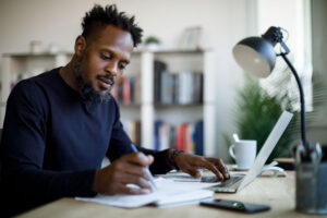 man studying at home